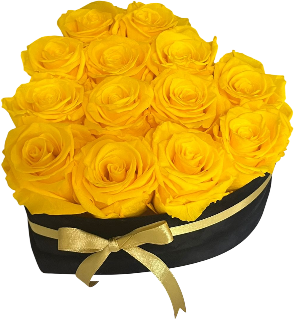 Elegante caja en forma de corazón con rosas amarillas frescas, símbolo de alegría y nuevos comienzos. Perfecto para celebrar la primavera y transmitir felicidad