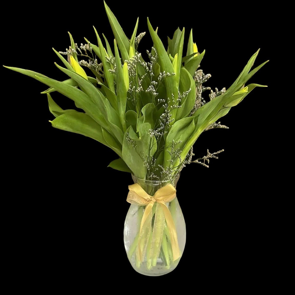 Fresh 10-tulip vase arrangement suitable for a thoughtful birthday surprise.