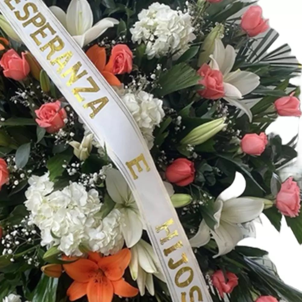 Tranquility Funeral Wreath, Sympathy And Condolences in Miami, is a beautiful tribute to honor your loved one, adorned with delicate white and pink flowers, sympathy and condolences, sympathy arrangements, sympathy flowers