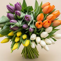 Arrangement of 10 fresh tulips in a vase by Bouquets Flowers, available as a floral gift in Miami and Doral.