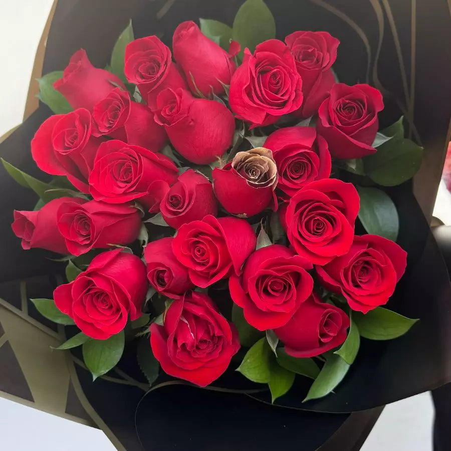 
                  
                    24 Red Roses in Buchon, intricately handcrafted with special papers, Miami roses and romantic gifts delivery service, bring a touch of romance to any occasion and leave a lasting impression with this stunning bouquet. Bouquets Flowers Miami
                  
                