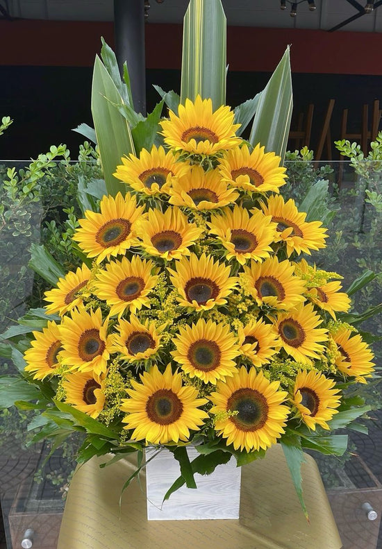 Impresionante arreglo de girasoles