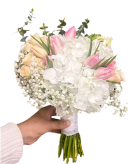 A bouquet of fresh and delicate flowers, including peonies and gardenias, that will make your special day even more magical. Order now at BouquetsFlowers.com and have it delivered to Miami.