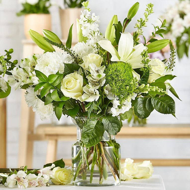 
                  
                    Classic White Surprising Flowers Bouquet And Vase, The Colors And Floral Kinds Utilized In This Bouquet Will Vary Depending On Availability And Freshness, Bouquets Flowers in Coral Gables, Miami, Delivery Flowers, Florist in Coral Gables.
                  
                