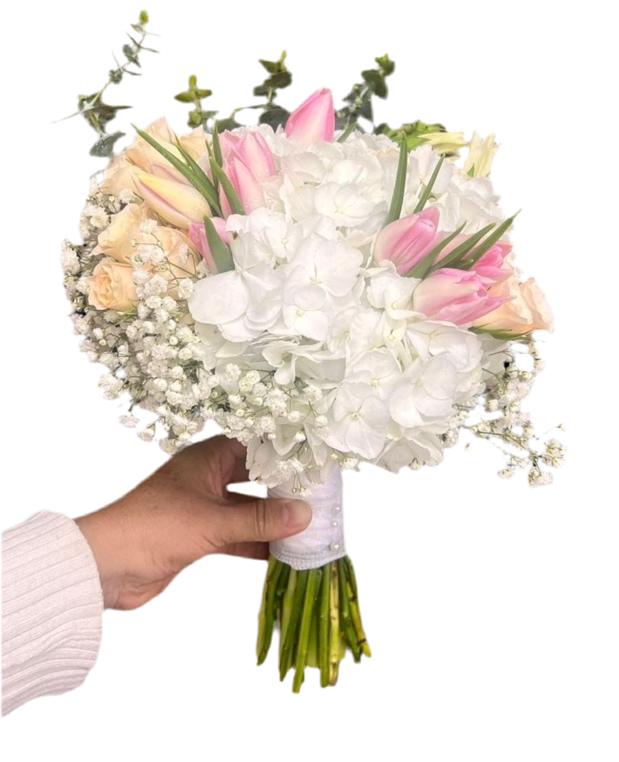 A bouquet of white roses and lilies that symbolizes pure and eternal love. Available at BouquetsFlowers.com and delivered to your doorstep in Miami.