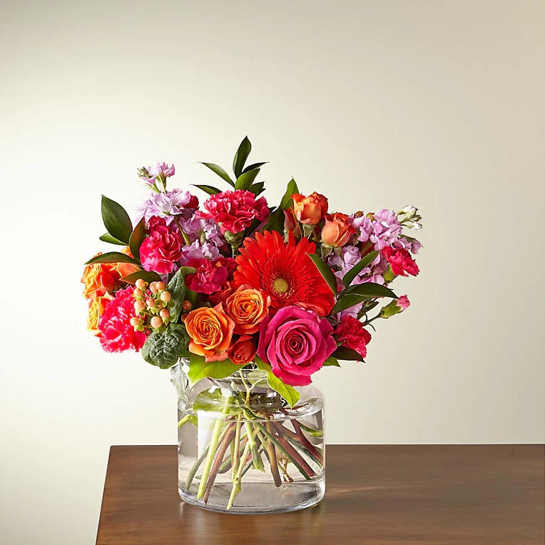 Happy Bouquet Flowers Deluxe Bouquet And Vase, Is a Vivacious Combination Designed To Celebrate Any And Every Occasion. This Florist Designed Arrangement, Made Up Of Colorful Flowers, Adds a Splash Of Color And a Surge Of Enthusiasm As Soon As It Arrives. Bouquets Flowers in Coral Gables, Miami, Delivery Flowers, Florist in Coral Gables.