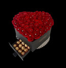 A sculptural expression of elegance and intention.

The Heart 100 – Signature Rose Box is composed of approximately one hundred premium roses, arranged in a refined heart-shaped structure that balances symmetry, depth, and softness.

Each rose is selected for its form and tone, creating a composition that feels both abundant and controlled — designed not simply to impress, but to remain present.

Presented in a luxury hat box, this piece reflects a quiet, elevated aesthetic rooted in our Midtown Miami studi