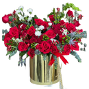 Reference image for our seasonal flower arrangement “Merry Golden Christmas” made with red roses, green and white tones that will make this arrangement the special gift of this season. Our flower shop is located in Miami. Bouquets Flowers.