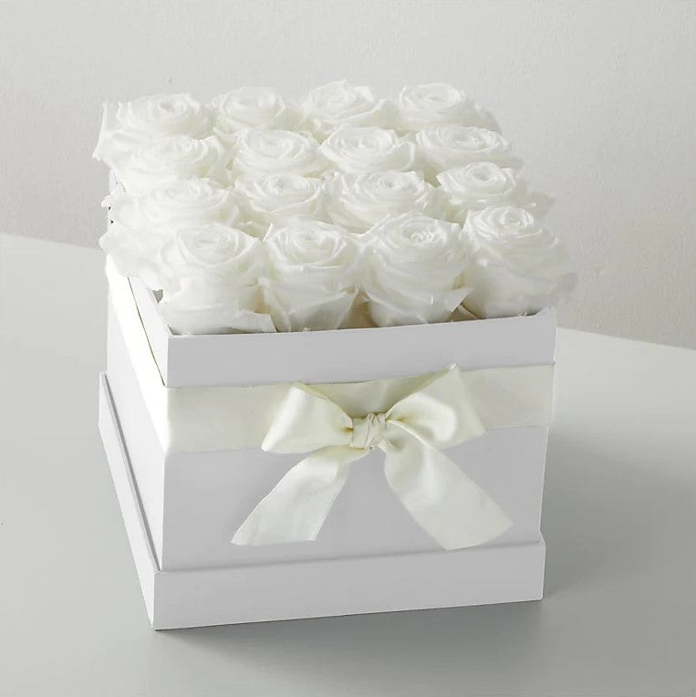 
                  
                    16 White Forever Roses, Observe How The Ivory Petals Of The White Forever Roses Remain As Clean As Snow Regardless Of The Season. These 100% Natural Flowers Are Maintained In Their Prime For More Than Two Years Of Splendour, Special Rose Bouquets And Arrangements, Rose Delivery, Anniversary Flowers & Gifts, Romantic Flowers & Gifts, Mother´s Day, Valentine’s Day. Bouquets Flowers in Coral Gables, Miami, Delivery Flowers, Florist in Coral Gables.
                  
                