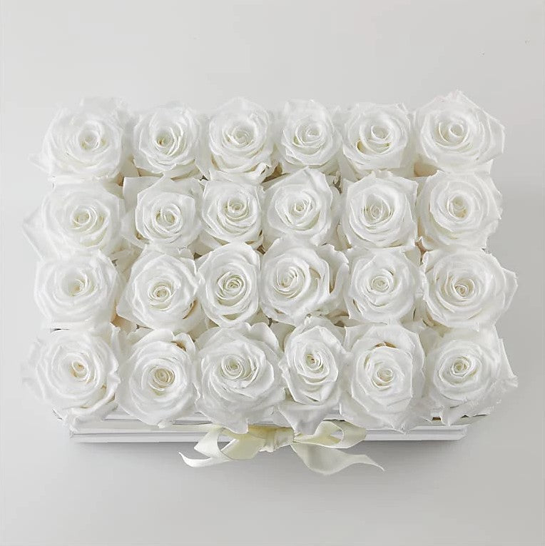 
                  
                    24 White Forever Roses, Observe How The Ivory Petals Of The White Forever Roses Remain As Clean As Snow Regardless Of The Season. These 100% Natural Flowers Are Maintained In Their Prime For More Than Two Years Of Splendour, Special Rose Bouquets And Arrangements, Rose Delivery, Anniversary Flowers & Gifts, Romantic Flowers & Gifts, Mother´s Day, Valentine’s Day. Bouquets Flowers in Coral Gables, Miami, Delivery Flowers, Florist in Coral Gables.
                  
                