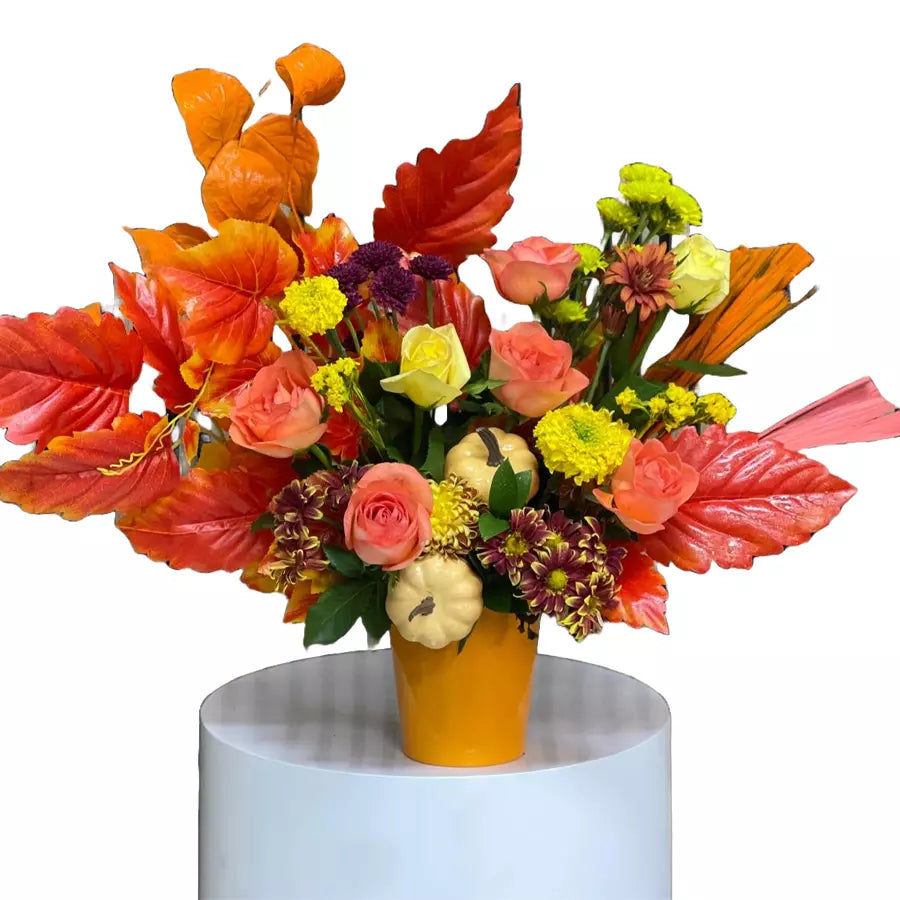 Autumn Flowers in a Yellow Vase. Experience the beauty of autumn with our stunning arrangement of flowers in a vibrant yellow vase! Bouquets Flowers Miami