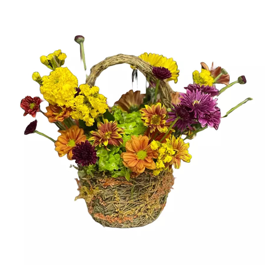 Transform your home into a cozy autumn oasis with our Autumn Flowers in Nest Base. Adorned with vibrant flowers in a charming nest base. Bouquets Flowers Miami