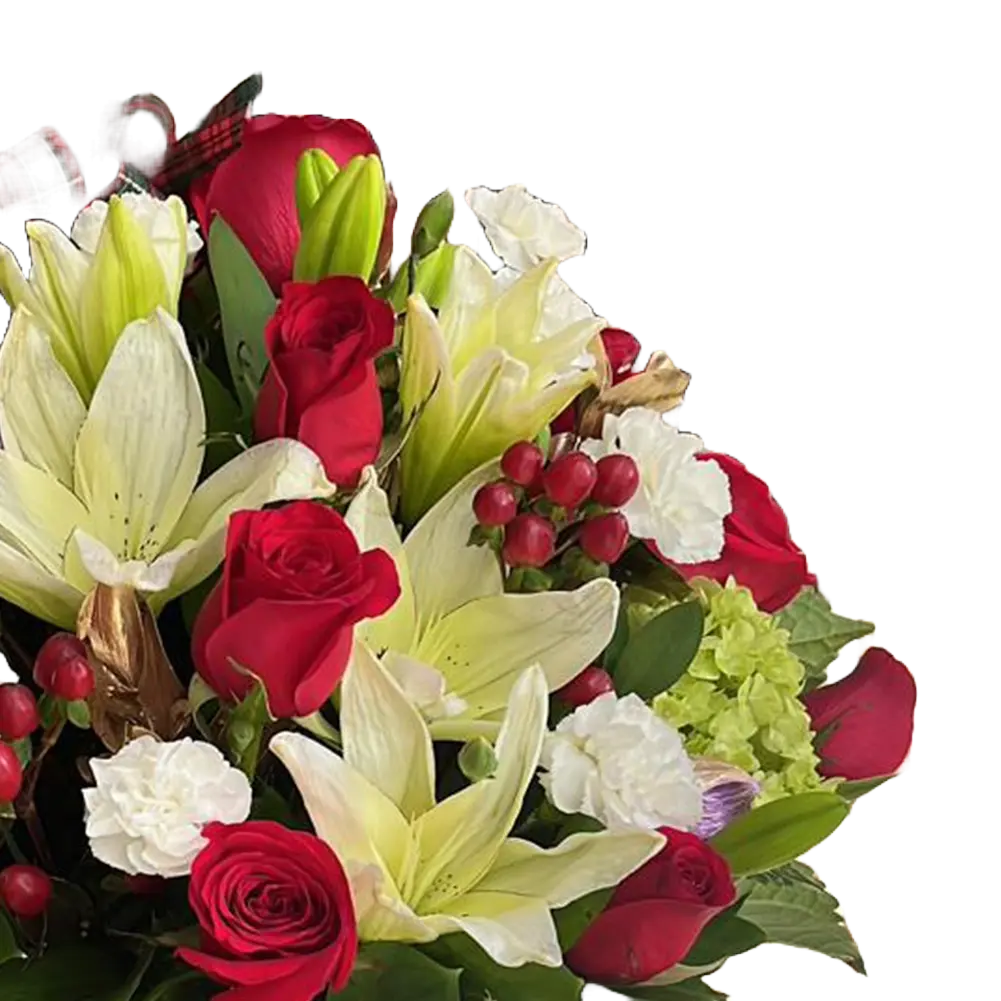 The image is of our floral arrangement with roses, lilies and carnations, we decorate them in a box with a Christmas theme, our flower shop is located in Doral, Miami. Bouquets Flowers. Detail view of the roses, lilies and carnations.