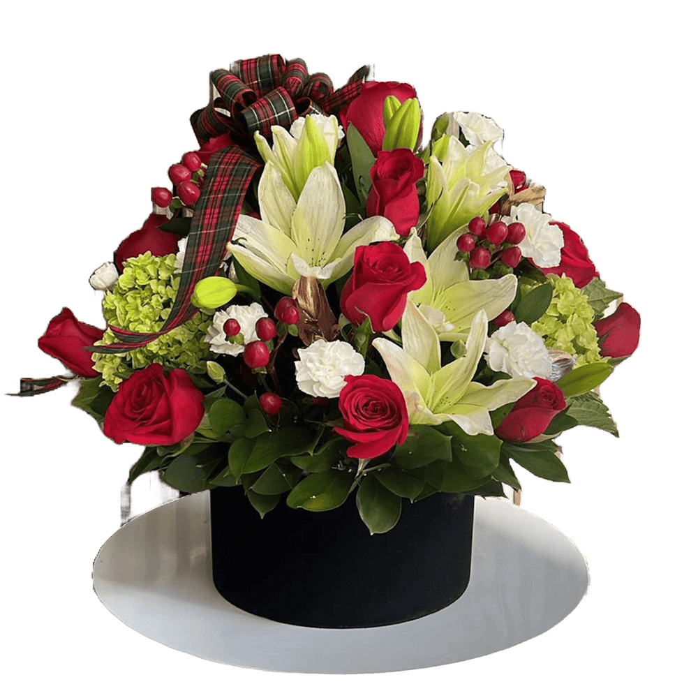 
                  
                      The image is of our floral arrangement with roses, lilies and carnations, we decorate them in a box with a Christmas theme, our flower shop is located in Doral, Miami. Bouquets Flowers
                  
                