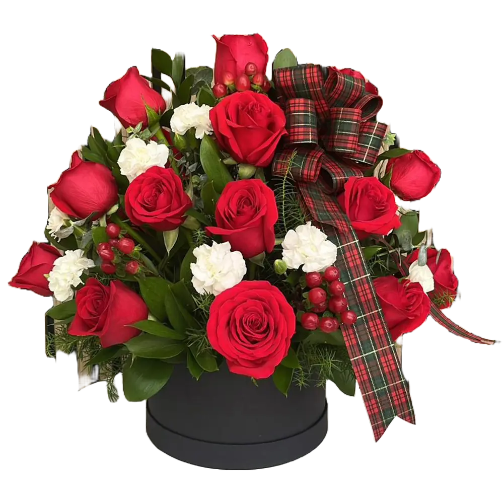 This image describes our arrangement with roses and carnations in a luxury box “Celebrating Christmas” accompanied by a Christmas bow. Bouquets Flowers. Miami florist