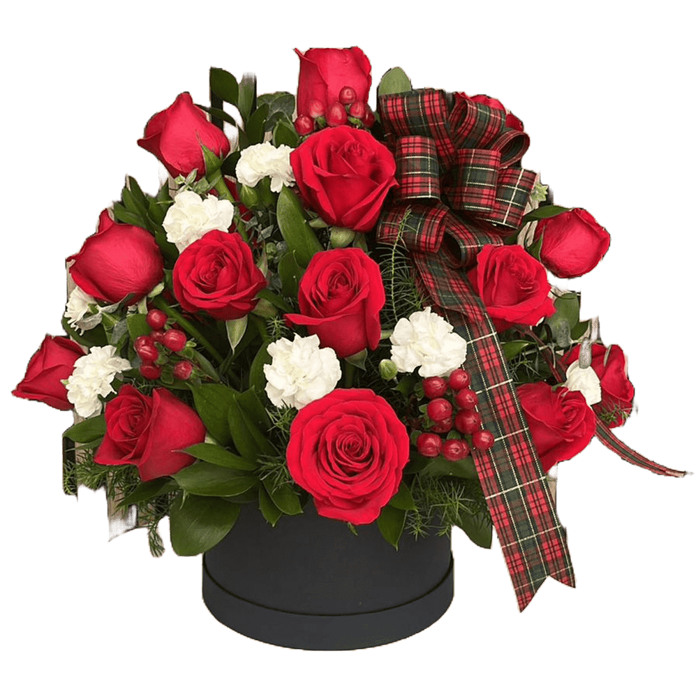 
                  
                    This image describes our arrangement with roses and carnations in a luxury box “Celebrating Christmas” accompanied by a Christmas bow. Miami florist, Bouquets Flowers
                  
                