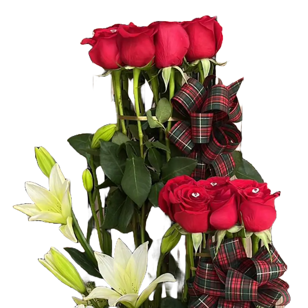 This image represents the details of our Christmas flowers, we made it with red roses and white lilies on a white wooden base, Our flower shop is located in Miami and Bogota. Bouquets Flowers