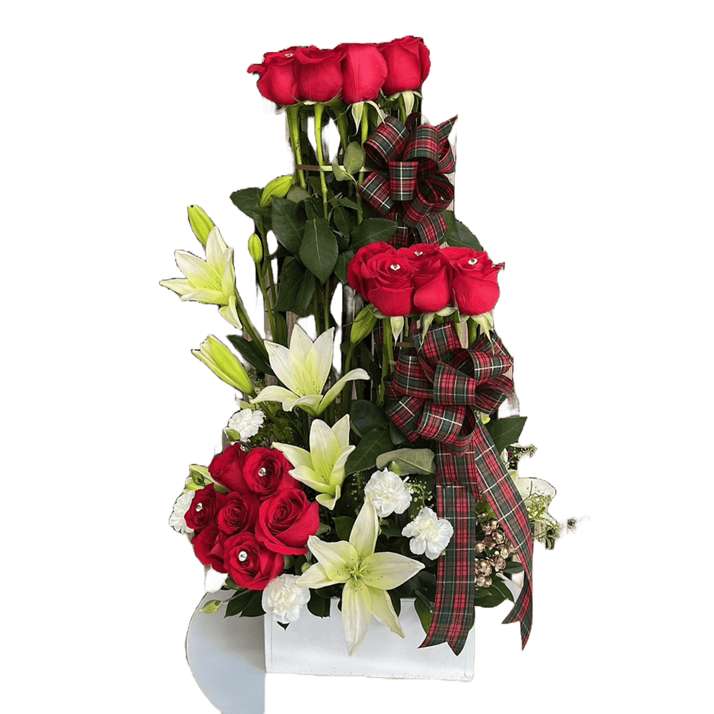 
                  
                    This image represents our christmas flowers arrangement, our arrangement is made with red roses and white lilies on a white wooden base, Our florist is located in Miami and Bogota. Bouquets Flowers
                  
                