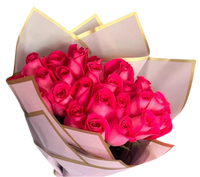 Fresh pink roses bouquet for Easter and spring with elegant pastel wrapping