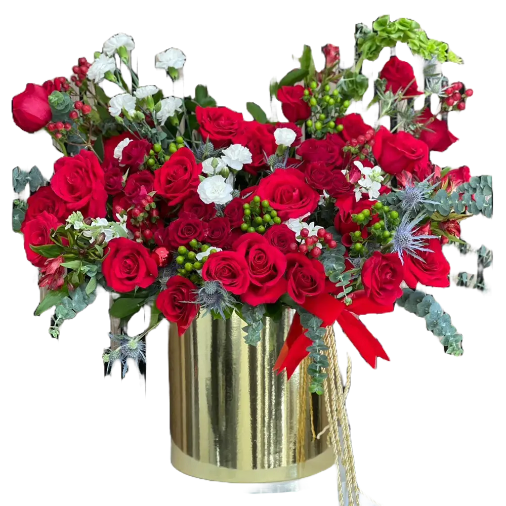 
                  
                    Reference image for our seasonal flower arrangement “Merry Golden Christmas” made with red roses, green and white tones that will make this arrangement the special gift of this season. Our flower shop is located in Miami. Bouquets Flowers.
                  
                