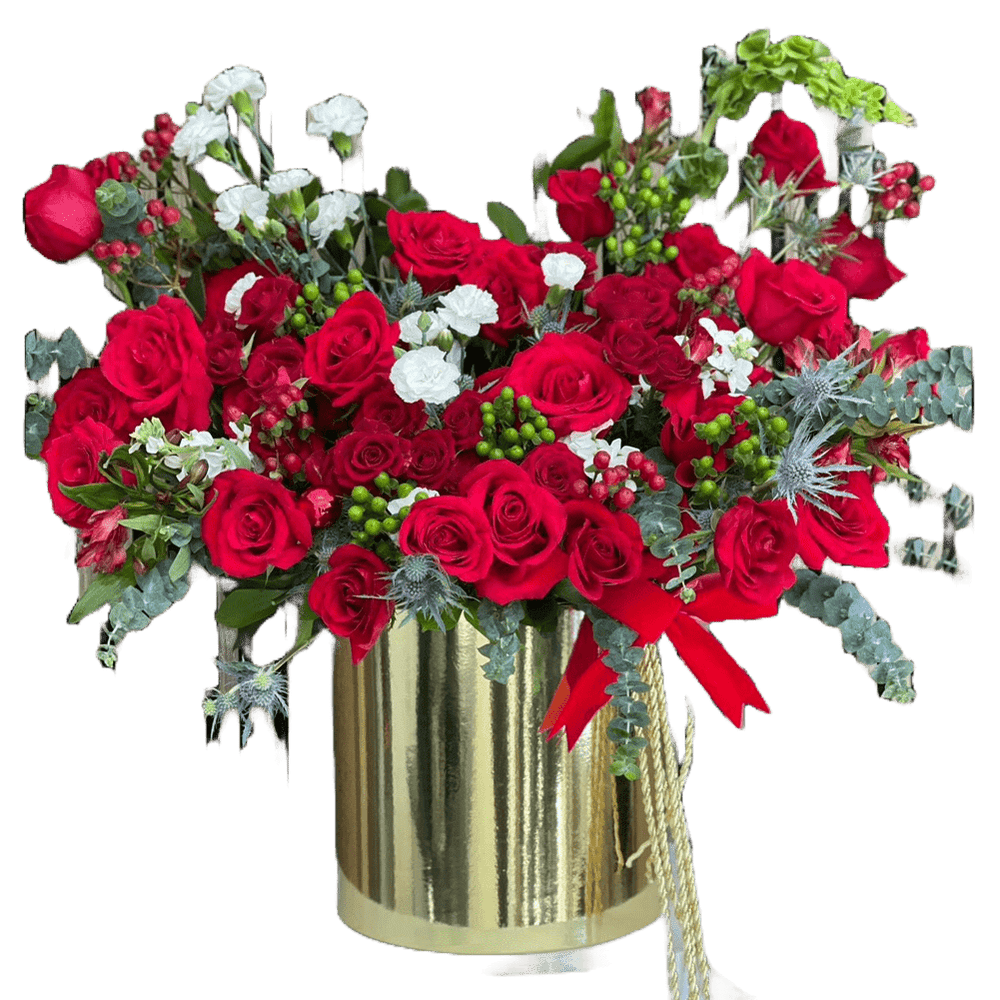 
                  
                    Bouquets Flowers. Reference image for our seasonal flower arrangement “Merry Golden Christmas” made with red roses, green and white tones that will make this arrangement the special gift of this season. Our flower shop is located in Miami.
                  
                