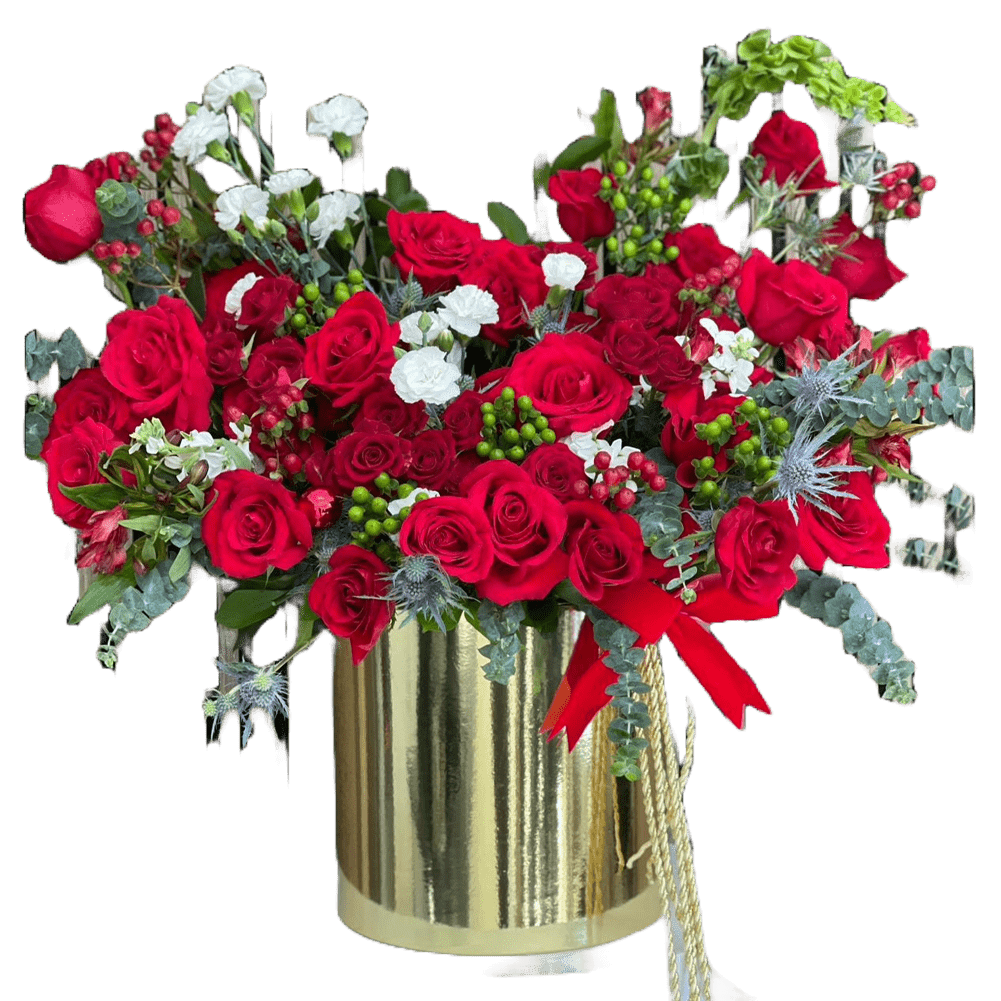 Bouquets Flowers. Reference image for our seasonal flower arrangement “Merry Golden Christmas” made with red roses, green and white tones that will make this arrangement the special gift of this season. Our flower shop is located in Miami.