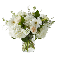 Rustic Mother’s Day flower basket with warm seasonal blooms and natural texture in Miami