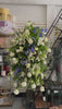With deepest sympathy and love, we remember [nombre del ser querido] and celebrate their life with these beautiful flowers.