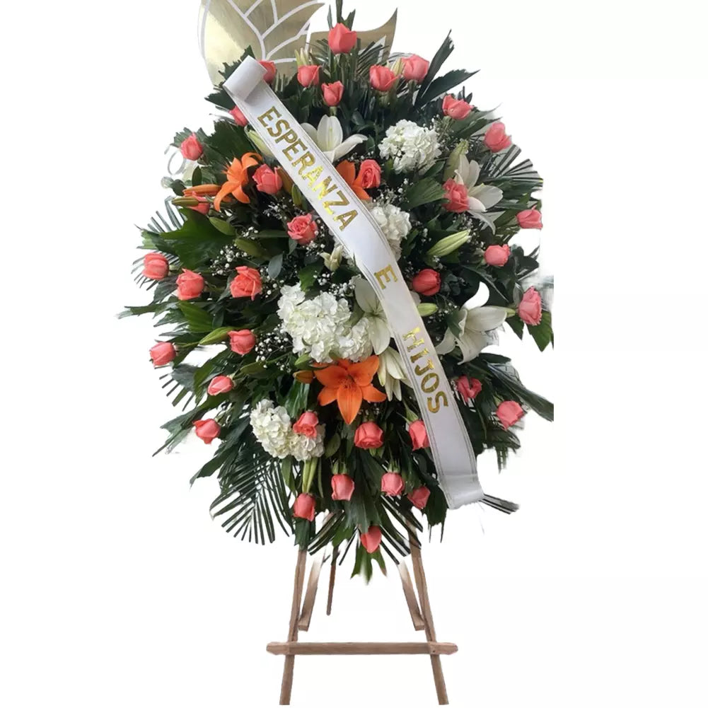 Tranquility Funeral Wreath, Sympathy And Condolences in Miami, is a beautiful tribute to honor your loved one, adorned with delicate white and pink flowers, sympathy and condolences, sympathy arrangements, sympathy flowers