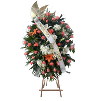 Tranquility Funeral Wreath, Sympathy And Condolences in Miami, is a beautiful tribute to honor your loved one, adorned with delicate white and pink flowers, sympathy and condolences, sympathy arrangements, sympathy flowers